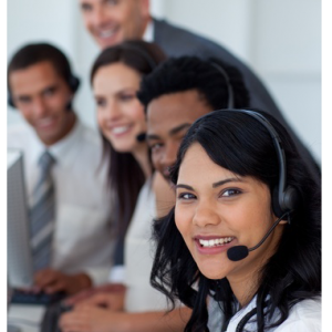 A photo of smiling call center operators.